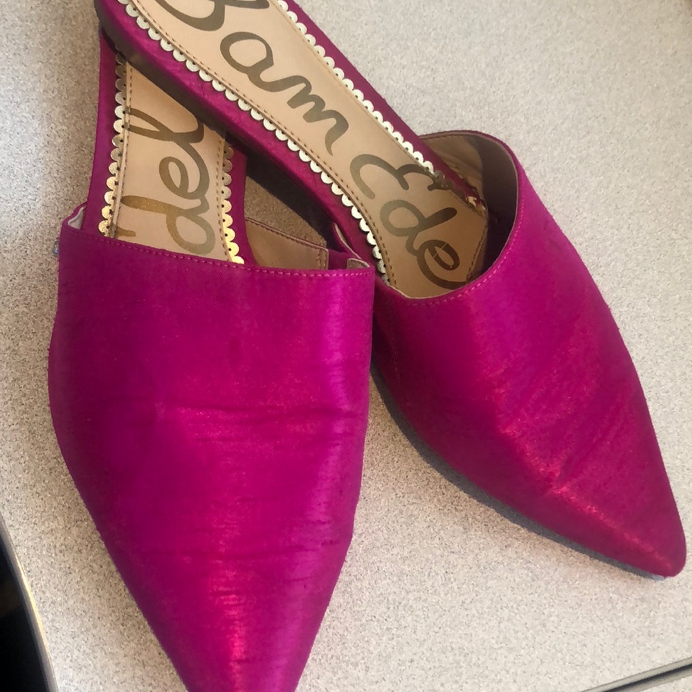 Pink pointed toe slides